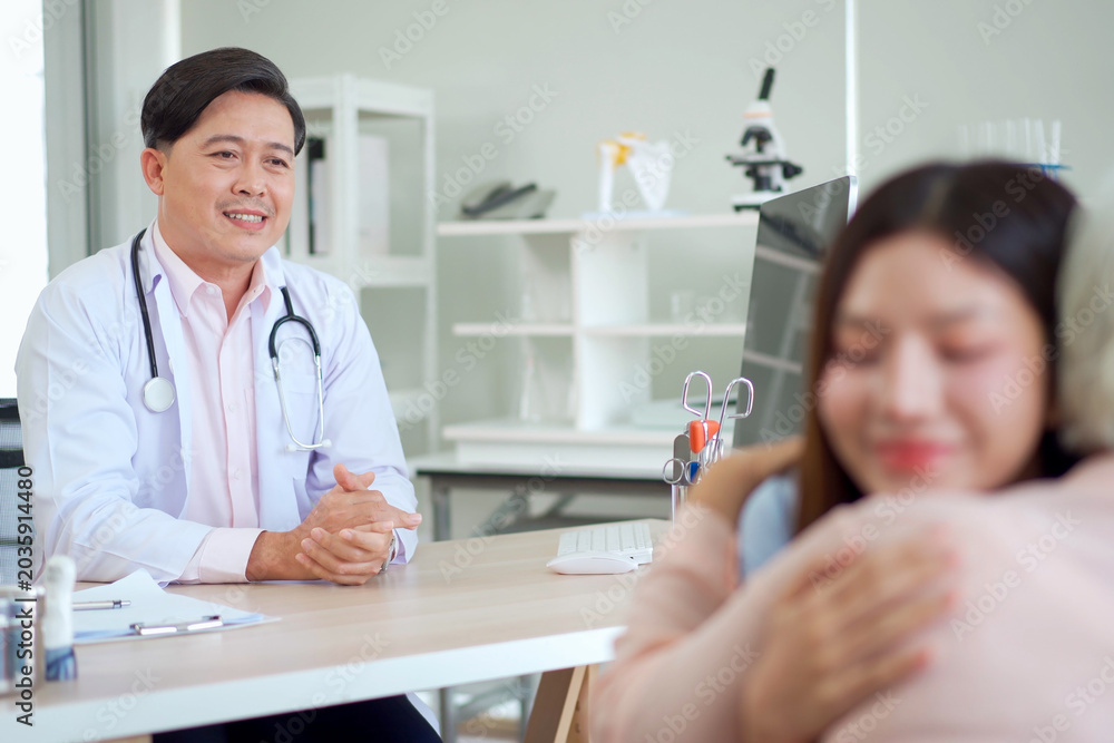 Fototapeta premium Asian woman accompanying elderly mother for medical checkup