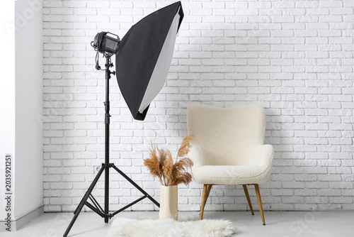 Modern photo studio with ar...