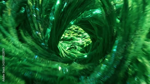 Organic emerald green fibrous landscape moving like fluid waves