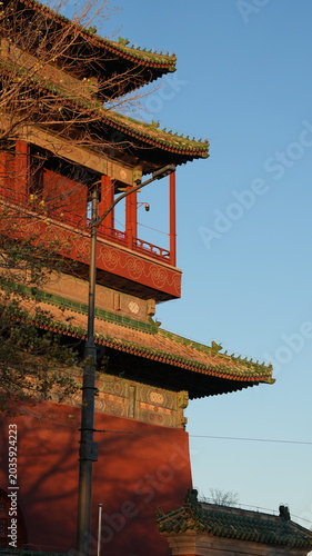 The old Forbidden city in Peking in winter with the warm sunset sunlight on them