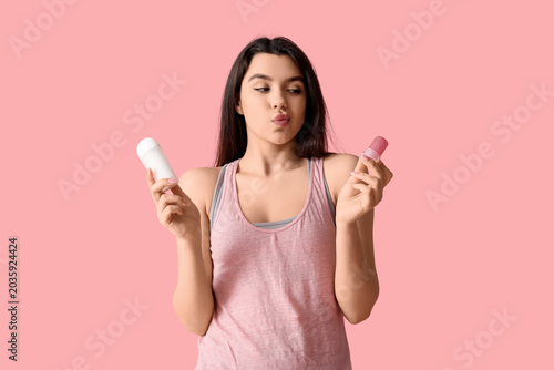 Thoughtful young woman with...