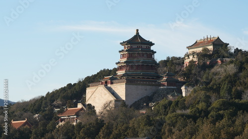 The Summer Palace view in Beijing of the China in winter with the warm sunlight and frozen lake