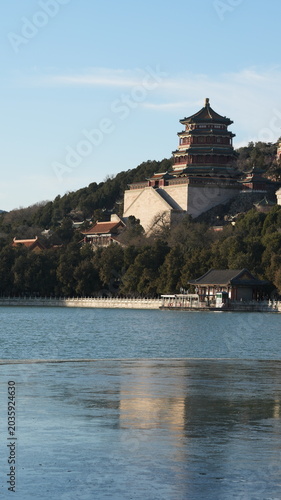 The Summer Palace view in Beijing of the China in winter with the warm sunlight and frozen lake