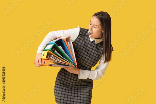 Young secretary dropping of...