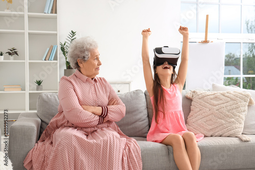 Senior woman and her little...
