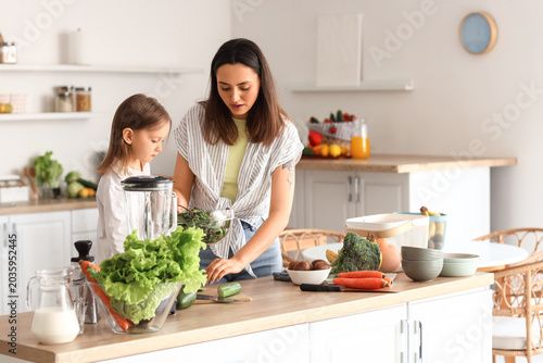 Little girl with her mother...