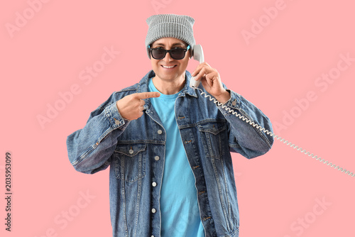 Mature man talking by telep...