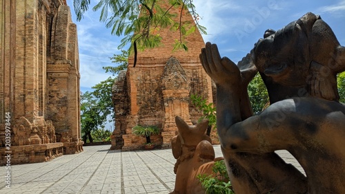 Heritage site in Nha Trang, Vietnam: Ancient Champa Kingdom's Po Nagar Towers surrounded by lush greenery