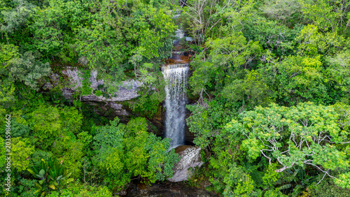 Canvas Print A breathtaking waterfall surrounded by vibrant greenery in the Colombian jungle captures the essence of untouched nature