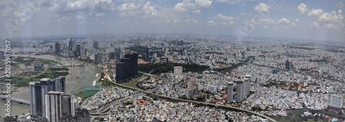 Cityscape in Ho Chi Minh City, Vietnam: Panoramic view of the skyline with the Saigon River and high-rise buildings in 2020