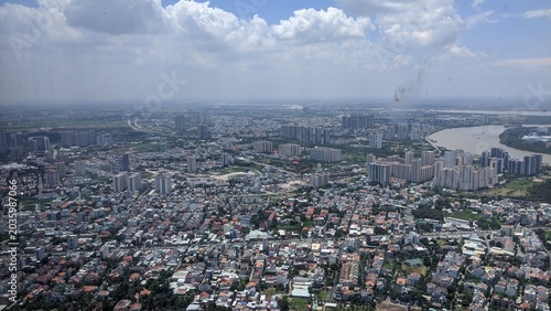 Cityscape in Ho Chi Minh City, Vietnam: Panoramic view of the skyline with the Saigon River and high-rise buildings in 2020