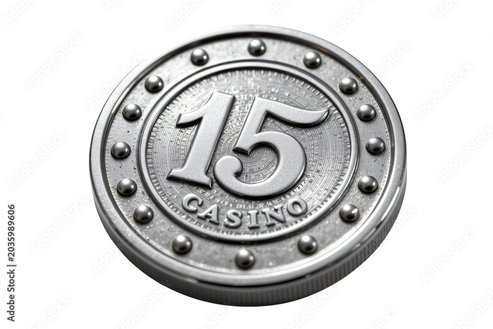 Obraz premium A metallic casino token displaying the number 15 with decorative studs and engraved details.