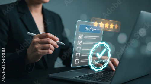 Businesswoman reviewing approved checklist with five-star rating and holographic document