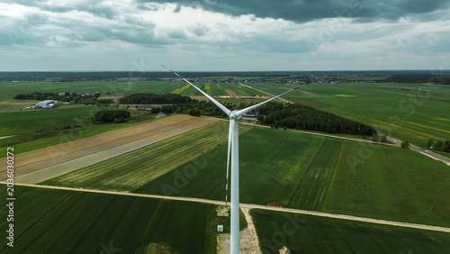 Single wind turbine in countryside field