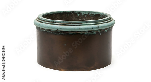 Cylindrical weathered bronze planter with a turquoise rim, isolated on white