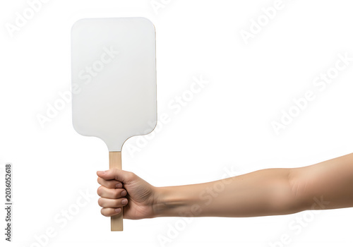 Hand holding blank sign on stick for message or announcement