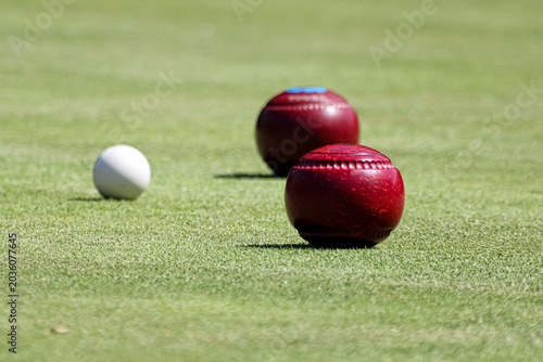 Quadro su tela Lawn bowling bowls and a jack ball on the grass on a bowling green in Edinburgh