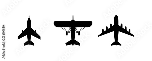 Tableau sur toile Three black silhouettes of different airplanes