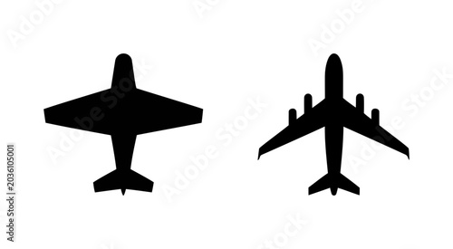 Schilderij op canvas Two airplane silhouettes flying high