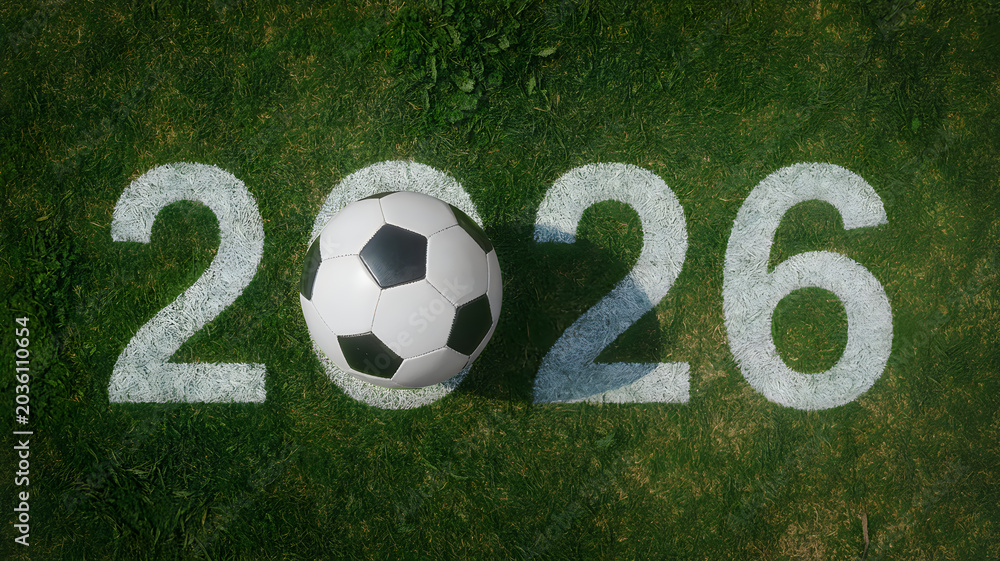 Obraz premium Soccer ball on a green field with 2026 painted numbers
