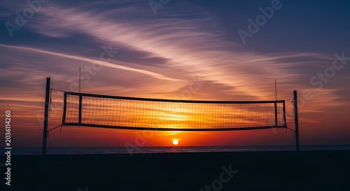 Beach volleyball net, sunset background, vibrant orange sky, sports scenery, outdoor recreation
