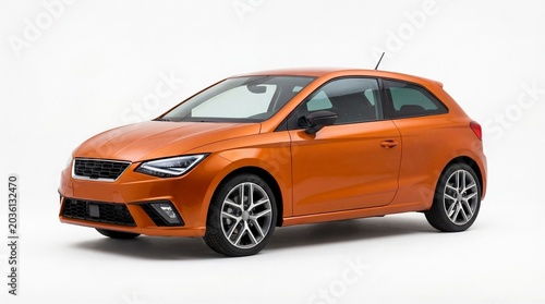 Obraz na płótnie Modern orange hatchback car on the road