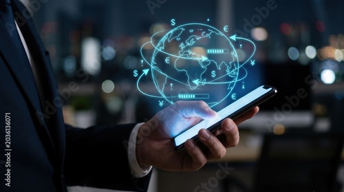 Global Mobile Fintech Concept: Professional Hand Holding Smartphone with Holographic Globe and Currency Icons