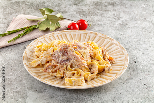 Bild auf Leinwand Italian pasta fettuccine with prosciutto