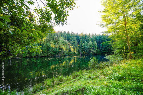 A view of the Weissbach pre-reservoir and the surrounding landscape. Nature at the reservoir in Saxony, near Stützengrün.
