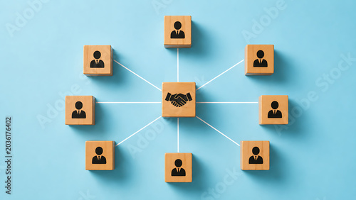 Collaborative partnership network concept with connected business people wooden blocks representing teamwork communication leadership and professional corporate relationships