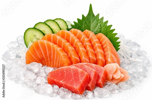 Fresh salmon and tuna sashimi slices on crushed ice with shiso leaf, cucumber and pickled ginger, isolated Japanese seafood on white background.