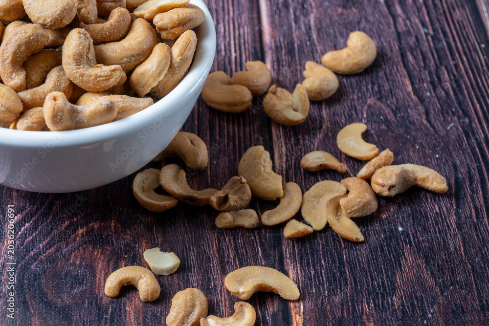 Fototapeta premium Salted Cashew Nuts In Bowl