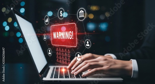 Cybersecurity warning alert on laptop with digital risk icons and dark background