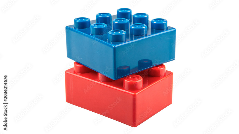Obraz premium Two interlocking blue and red plastic toy bricks children building blocks on transparent background