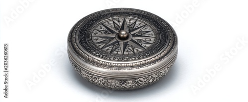 Antique silver compass guiding your journey like a trusty shipmate on the waves