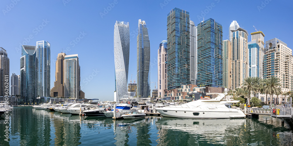 Obraz premium Dubai Marina skyline panorama cityscape with yachts skyscraper buildings living at water
