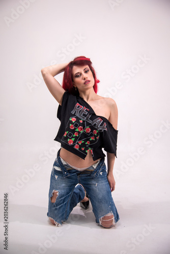 Young woman modeling casual rebellious fashion style