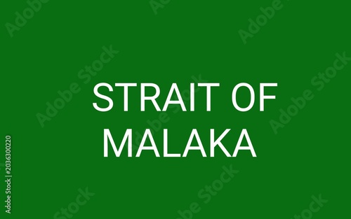 road sign with words green background 'strait of malaka'