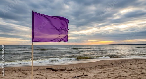 Purple Beach Flag Waving on Sandy Shoreline at Cloudy Sunset
