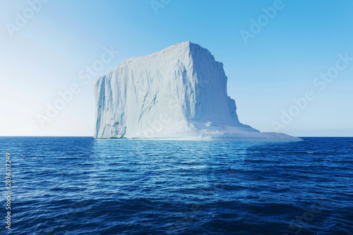 Photography colossal massive tabular iceberg floating in a ocean under a clear blue sky
