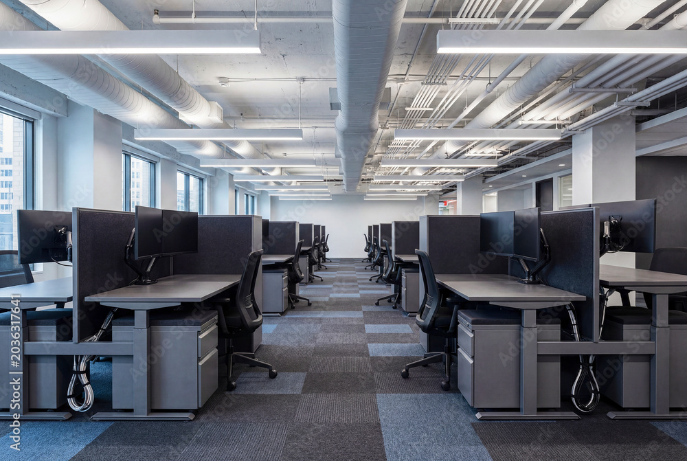 Fototapeta premium Modern Office Interior With Bright Daylight and Clean Work Areas for Business and Corporate Use