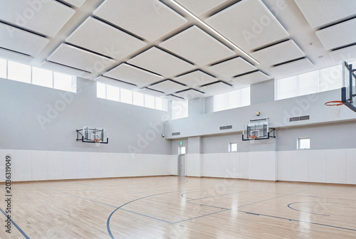 Bright School and Community Gymnasium Interior With Indoor Court and High Ceiling
