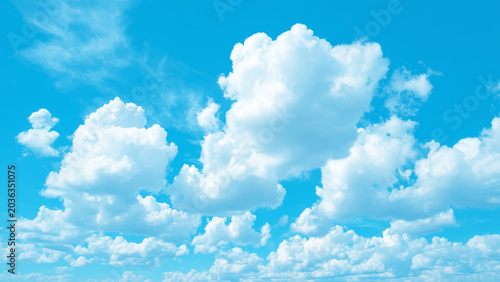 Photos Beautiful blue sky with white fluffy clouds on a sunny day  natural scenery