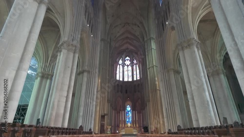Majestic Interior of Reims Cathedral in France, Tilting Up to Reveal Grand Gothic Vaulted Ceilings and Pillars.