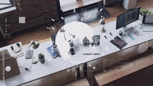 Hologram globe appearing above communal desk, rotating with network lines showing global funds flow