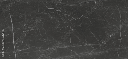black marble background. black Portoro marbl wallpaper and counter tops. black marble floor and wall tile. black travertino marble texture. natural granite stone.
