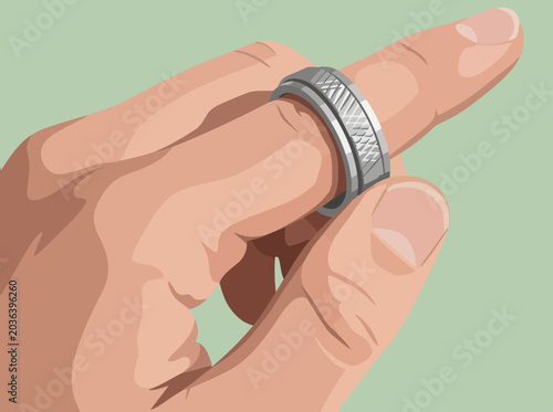 Photos A hand holds a textured spinner ring, demonstrating its tactile focus