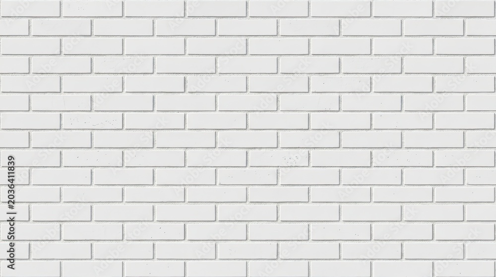 Obraz premium A white brick wall is presented. The wall is constructed of rectangular bricks arranged in a horizontal pattern.