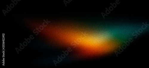 Black grainy background with rainbow glowing spot, abstract dark backdrop with noisy gradient texture 