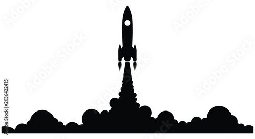 Fotografie A black silhouette of a rocket launching with fiery exhaust plumes